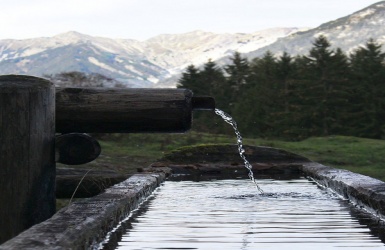 Northern Italy: water source with active factory